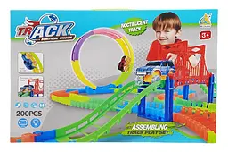 Дитячий гоночний автотрек гнучкий світиться в темряві Assembling Track Play Set XC235B в коробці р.44х8, 5х30, 2см