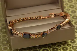Браслет Xuping Jewelry Танкетка із чорними каменями 19 см 7 мм золотистий