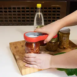 Багатофункціональна відкривачка євро ключ знімач для відкривання та закривання гвинтових кришок твіст і пляшок Сірий з жовтогарячим, Kitchen Master Серый с оранжевым 86379 - мініатюра 4