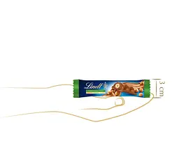 Шоколадний батончик Lindt Ganze Haselnuss Milch Chocolate Bar 35 г - мініатюра 4