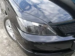Вії фар Fly для Mitsubishi Lancer 9 04-10 Чорні 2 шт