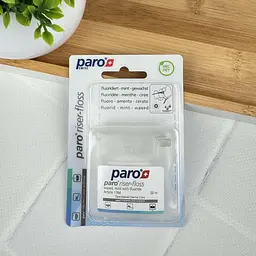 Зубна нитка Paro riser-floss вощена розпушуюча (з м'ятою та фторидом), 50 м