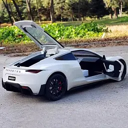 Колекційна металева модель автомобіля АвтоЕксперт Tesla Roadster із зарядною станцією, інерцією, світлом та звуком 1:24 - мініатюра 9