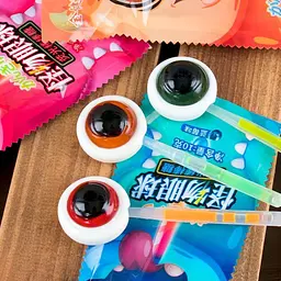 Цукерка-льодяник SSNS Halloween Glow Bone Eye Lollipop Candy зі світловим ефектом 10г - мініатюра 6