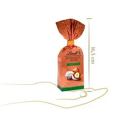 Шоколадні цукерки з фундуком Lindt Weihnachts Nusse Haselnuss 100г - мініатюра 2