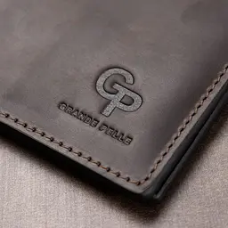 Шкіряний чоловічий затискач для грошей Grande Pelle 11540 коричневий