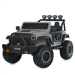 Електромобіль джип 24V7Ah 2x45W 2.4G пульт EVA MP3 Bluetooth шкіра сірий (M 6065EBLR-11)