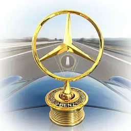 Емблема приціл на капот Mercedes-Benz-Benz Золотий напис W124 W210 W202. W203 W204 W221 W211 W212 W222 метал (OEM a2218800086)