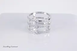 Каблучка з білого золота з фіанітами 18 K-0223