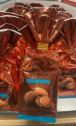 Шоколадні цукерки з мигдалем Lindt Weihnachts Mandeln Caramel Salz 100г - мініатюра 8