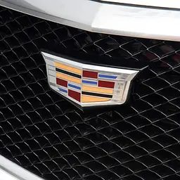 Емблема передня Cadillac чорна+ кольорова вставка 210х90мм пластик (на защіпках) - мініатюра 3