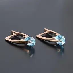 Дитячі сережки з червоного золота з топазами S-0011