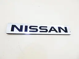 Емблема напис Nissan (Хром+ Чорні букви) 149х25 мм (на скотчі) - мініатюра 2