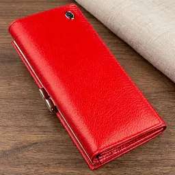 Жіночий гаманець із монетницею на клямці ST Leather 18957 червоний