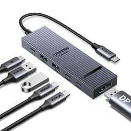 Док-станція USB-C UGREEN Revodok CM818 6 в 1 DisplayPort 1.4 4K 60 Гц 2K 120 Гц 1080p 144 Гц потрібен USB-C з DisplayPort Alt Mode режими HDR і VRR потребують підтримки джерелом кабелем та дисплеєм 2 USB-A та 2 USB-C для даних USB 3.2 Gen 2 до 10 Гбіт/с вхід USB-C PD 3.0 до 100 Вт наскрізне заряджання потребує зарядного пристрою PD і кабелю USB-C ↔ USB-C дублювання/розширення Windows macOS Linux кабель в обплетенні 0,3 м космічний сірий (75244)