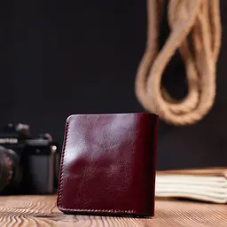 Жіноче глянсове шкіряне портмоне Shvigel 16609 вишневе - мініатюра 9