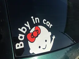 Наклейка в автомобіль Baby in car girl