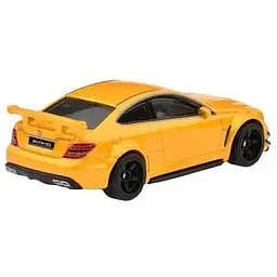 Колекційна модель машинки Hot Wheels '12 Mercedes-Benz C63 AMG Coupe Black Series серії Преміальні авто жовта (GJT68/HKF23) - мініатюра 3