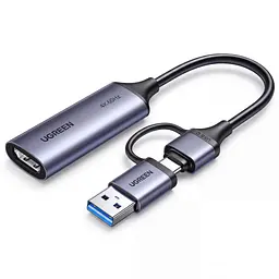 Карта захоплення відео й звуку для трансляцій і запису UGREEN UG307 HDMI-вхід і USB 3.0 вихід до хоста через USB-A або USB-C Режими 4K 60 Гц 2K 60 Гц та 1080p 240 Гц Для заявлених частот дисплей має підтримувати відповідний режим Сумісна з Linux і системами Windows та macOS Працює без встановлення драйверів Вбудований кабель завдовжки 12 см Алюмінієвий корпус відводить тепло Формат PCM 2.0 Космічний сірий (95348)