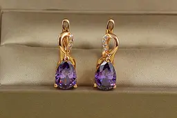 Сережки Xuping Jewelry Скандинавія з фіолетовим каменем 1,8 см золотисті