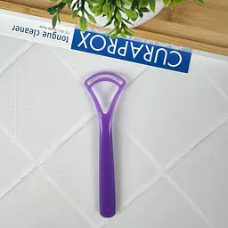 Скребок для язика Curaprox дві дуги (фіолетовий)