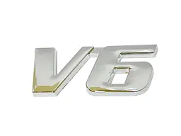 Емблема напис V6 59х26 мм Хром на скотчі метал (Завод)