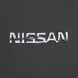 Емблема напис Nissan 120 x 22 мм скотч 3M