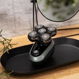Електробритва для голови Remington Ultimate Series RX7 роторна чорно-зелена (XR1600) - мініатюра 5