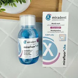 Ополіскувач для ротової порожнини Miradent Mirafluor з CHX 0,06% 100 мл - мініатюра 2