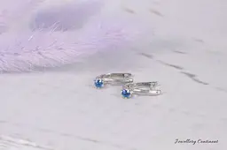 Сережки з білого золота з сапфірами S-0087