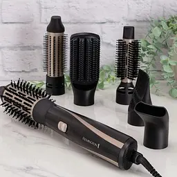 Фен-щітка Remington Blow Dry & Style Caring, 1200Вт, 2 режими, іоніз-я, хол. обдув, кейс для зберігання, кераміка, чорно-золотий - мініатюра 2