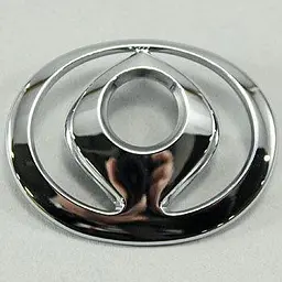 Емблема для Mazda 626 / 323 пластикова 63 x 50 мм