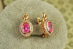 Сережки Xuping Jewelry Магічний овал з рожевим каменем 1.7 см золотисті