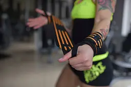 Бинти кистьові Olimp Sport Nutrition Hardcore Wrist Wrap - мініатюра 5