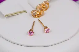 Сережки гвоздики Xuping Jewelry рожевий камінь 3 мм золотисті
