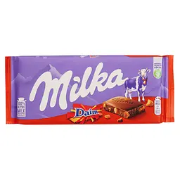 Шоколад молочный Milka с кусочками карамели с миндалем 100 г