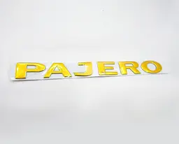 Емблема PAJERO для Mitsubishi золото 232х24 мм (на скотчі) - мініатюра 3