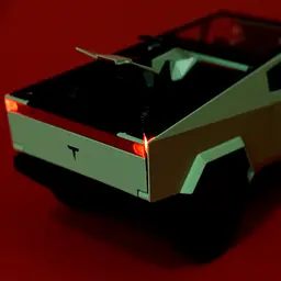 Колекційна металева модель автомобіля Автопром Tesla Cybertruck з квадроциклом, інерцією, світлом та звуком 1:24 - мініатюра 8