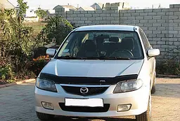 Дефлектор капоту мухобійка для Mazda 323 S/F 2000-2003