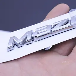Емблема напис Mazda 3 2014-2015 Sedan скотч 3М 140 x 15 мм Польща - мініатюра 2