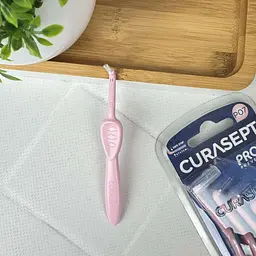 Міжзубний йоржик кутові Curasept Proxi Angle P07, ISO1 (0.7 мм, розовий) без ковпачка, 1 шт