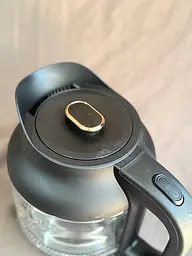 Дисковий скляний електрочайник Grunhelm EKG-25011B 1,2л 630Вт Чорний - мініатюра 3