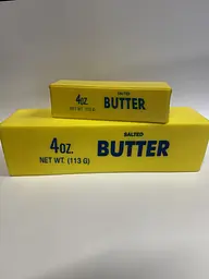 Набір антистрес велике масло Butter гігант 24 см і стандартне жовте з запахом 2 шт. - мініатюра 4