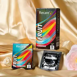Презервативи Holographic Recare Fruit Flavour Condoms 12 шт, аромати: м'ята, банан, полуниця - мініатюра 6