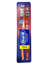 Зубна щітка Oral-B 3-Effect Classic, середня, червоний з помаранчевим, 2 шт.