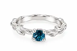 Золота каблучка «Гілочка» з топазом London Blue К-0848 21.5