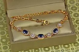 Браслет Xuping Jewelry малинки із синіми каменями з колами 17,5 см 7 мм золотистий