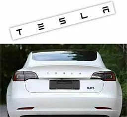 Емблема напис Tesla матова Чорна Пластик на скотчі (букви) (Завод)