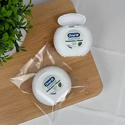 Зубна нитка Oral-B Essential Floss Mint вощена (м'ятна), 50 м, без коробки - мініатюра 2