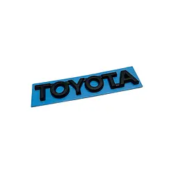 Емблема надпис TOYOTA чорна 94х19мм пластик (на скотчі)